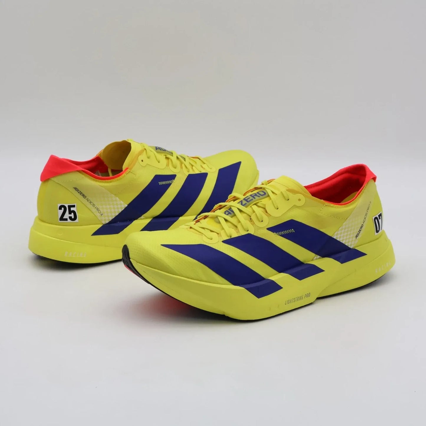 ADIZERO ADIOS PRO 4  AMARILLO/AZUL