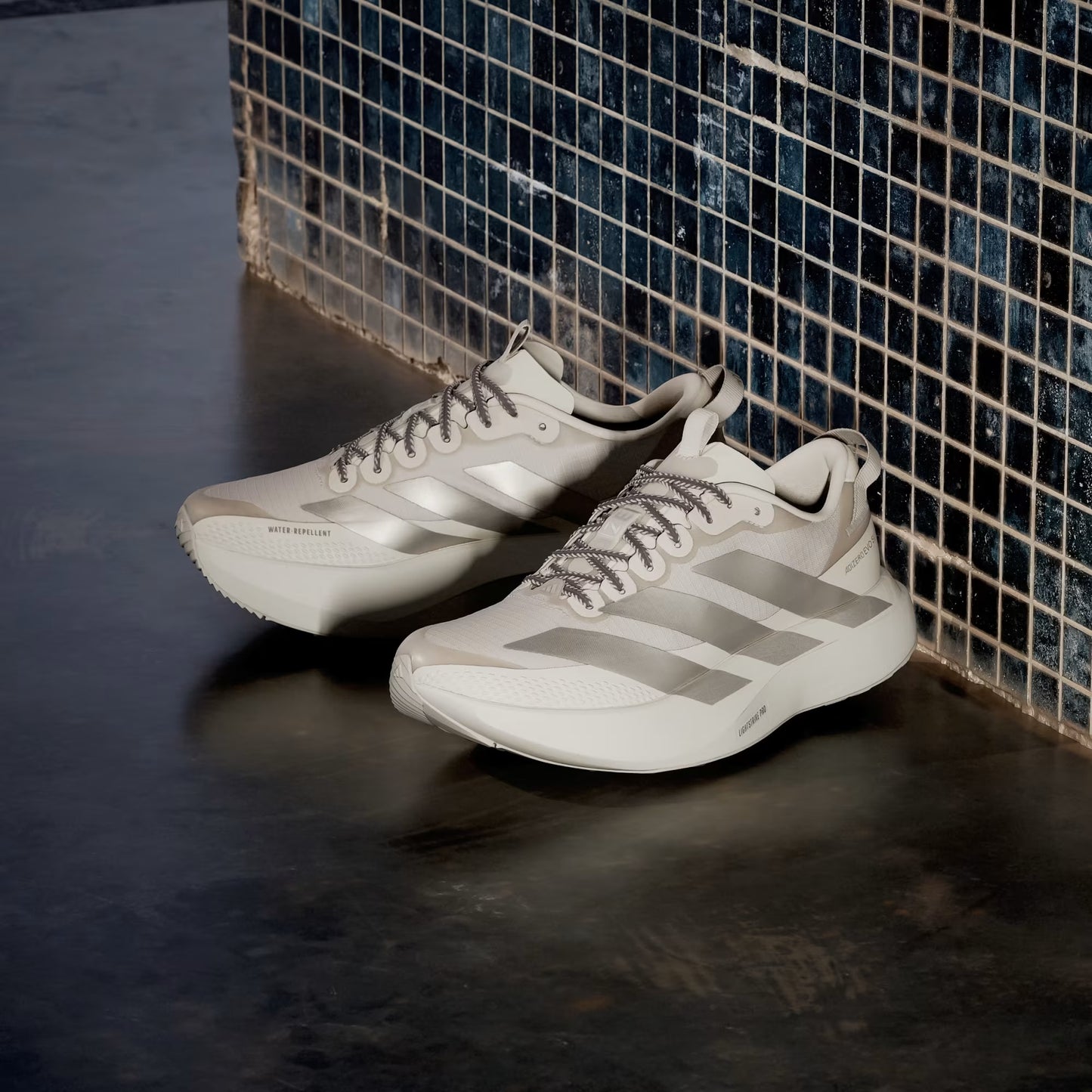 ADIDAS ADIZERO EVO SL ATR GRIS