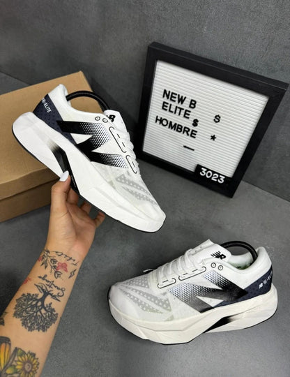 NEW BALANCE ELITE V4 BLANCO/NEGRO