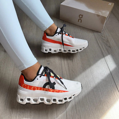 ON RUNNING CLOUDMONSTER BLANCO/NARANJA