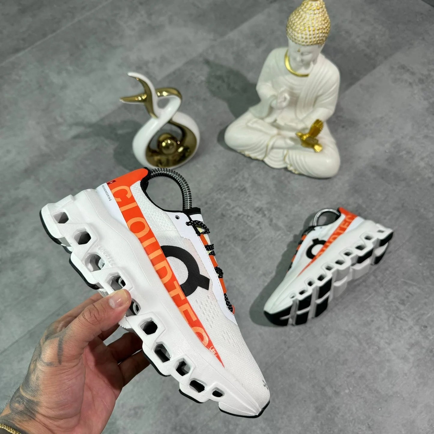 ON RUNNING CLOUDMONSTER BLANCO/NARANJA