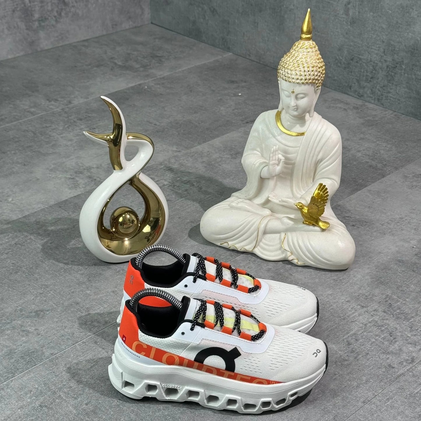 ON RUNNING CLOUDMONSTER BLANCO/NARANJA