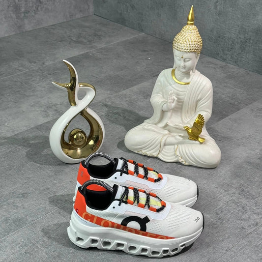 ON RUNNING CLOUDMONSTER BLANCO/NARANJA